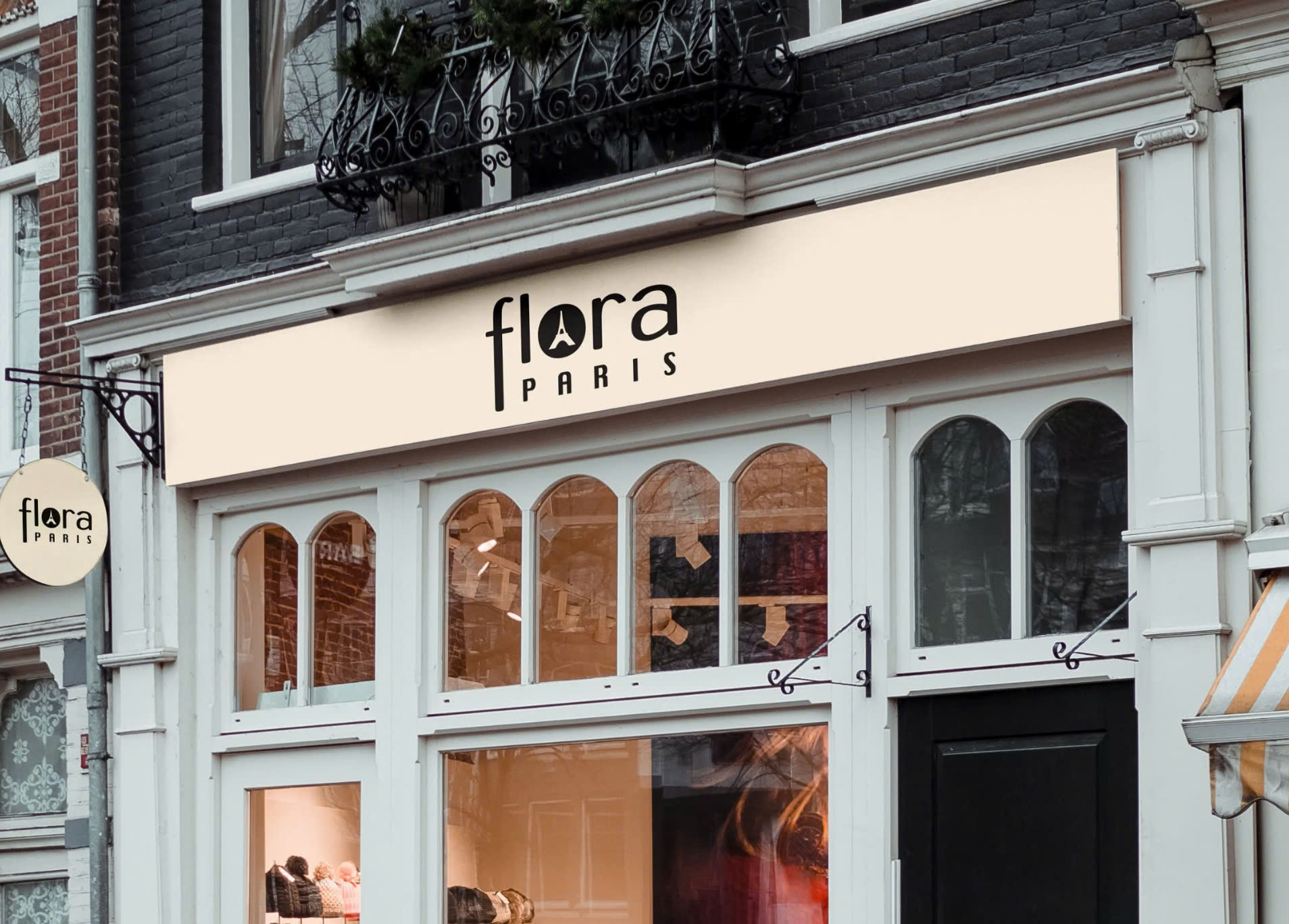 Flora paris logo on the advertising board infront of the shop